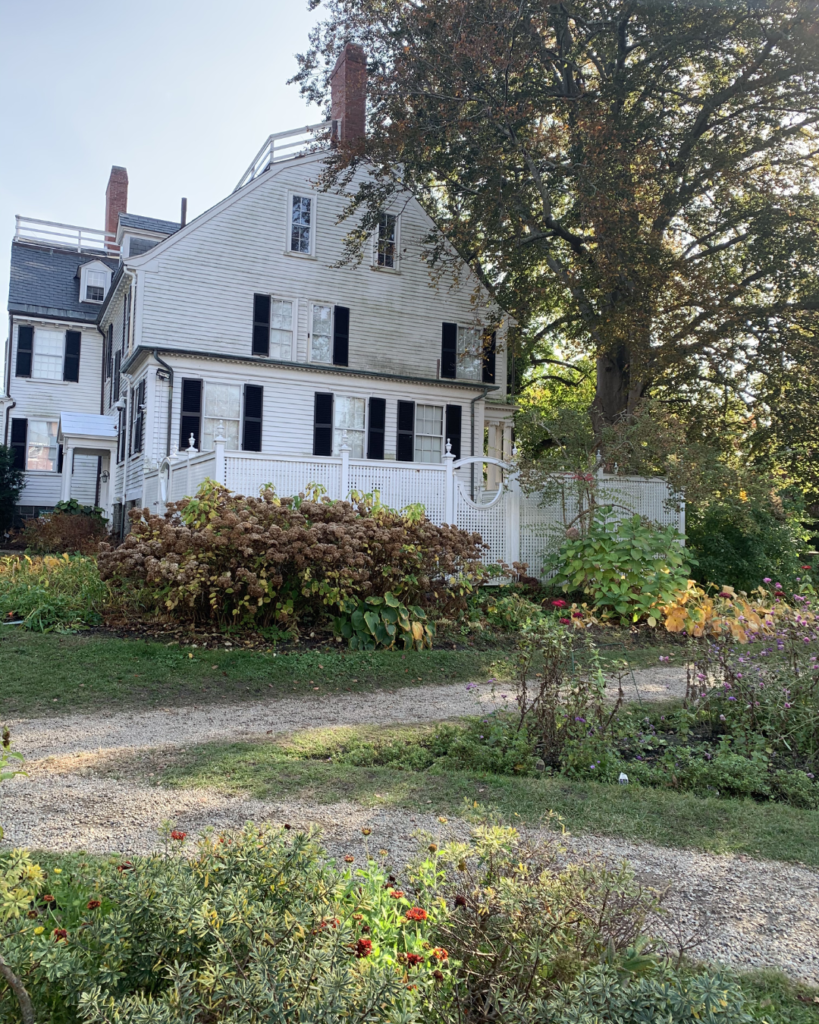 Historical house with garden in bloom.